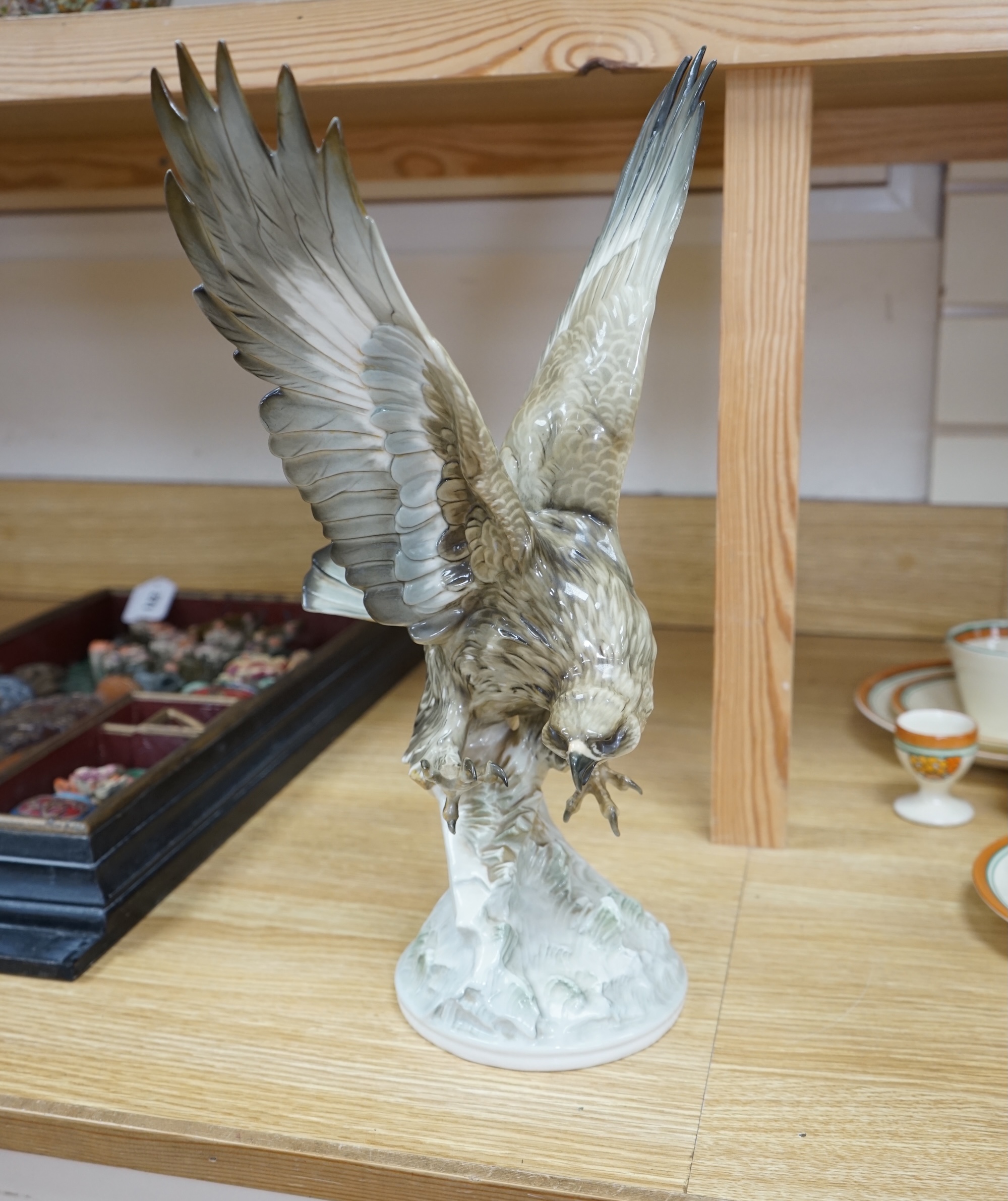 Karl Tutter (1883-1969) for Kutschenreuther, a porcelain model of a hawk, 42cm. Condition - restoration? otherwise good